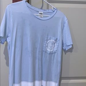 PINK light blue and white short sleeve shirt.